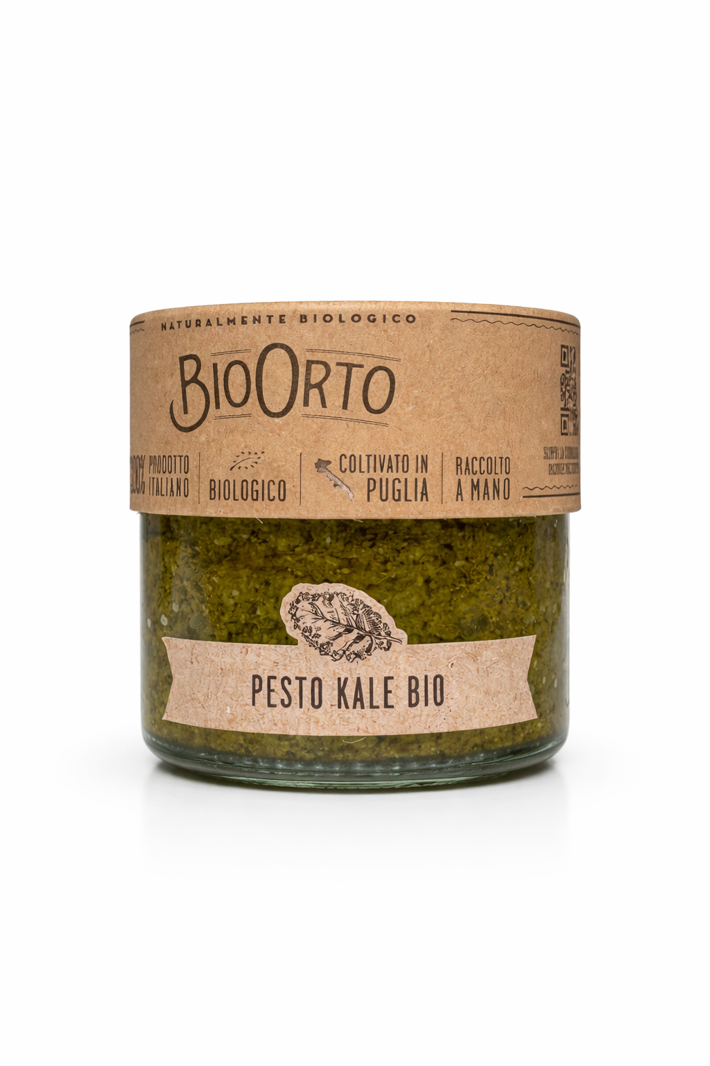 Kale pesto in a glass bottle. Italian organic spread pesto