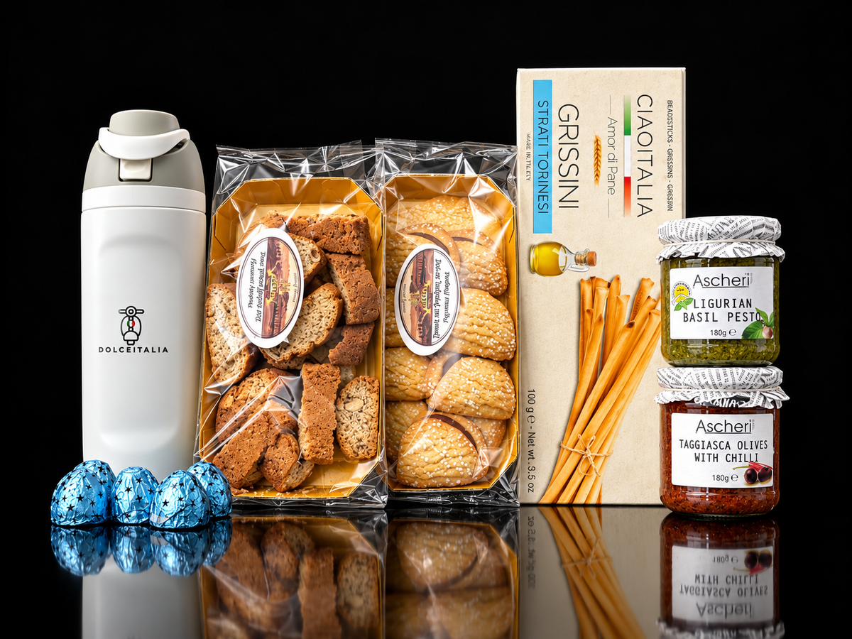 A curated gift set featuring a white DolsiFrateria thermos, two clear bags of assorted Italian breads and pastries, a box of Italia Grissini, two jars of Aschâri spreads, and four blue speckled chocolate Pearline. Italian Hampers australia