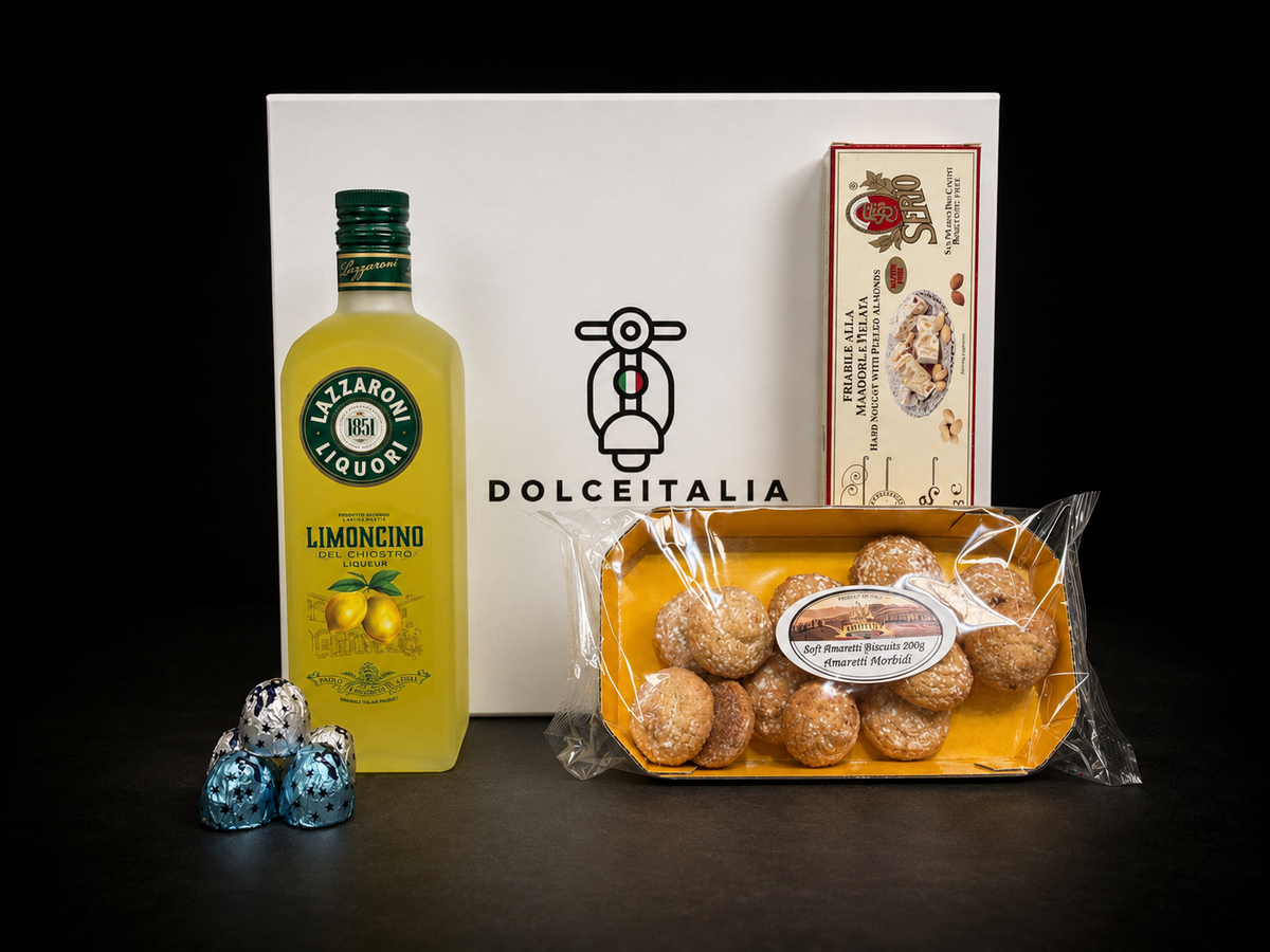 A Dolceitalia gift set on a black background, featuring a bottle of Limoncino , a tray of chocolate-covered pastries, blue and silver wrapped chocolates, and a white Dolceitalia box. Italian limoncino. Italian gourmet gifts hamper australia 