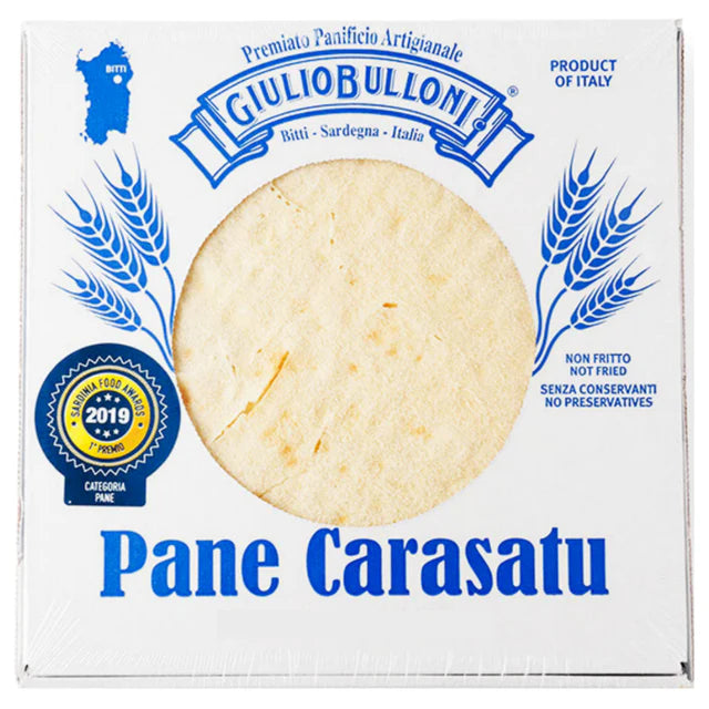 Box of Giulio Bulloni Pane Carasatu with a picture of bread and branding elements.