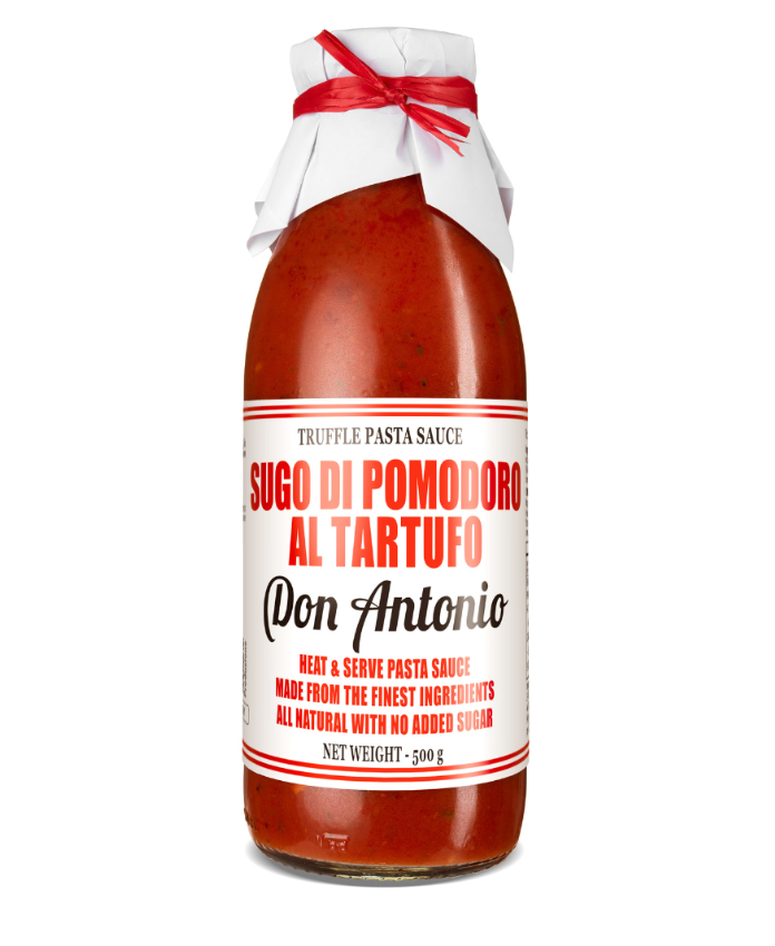 Bottle of Don Antonio truffle pasta sauce with a red ribbon on a white background