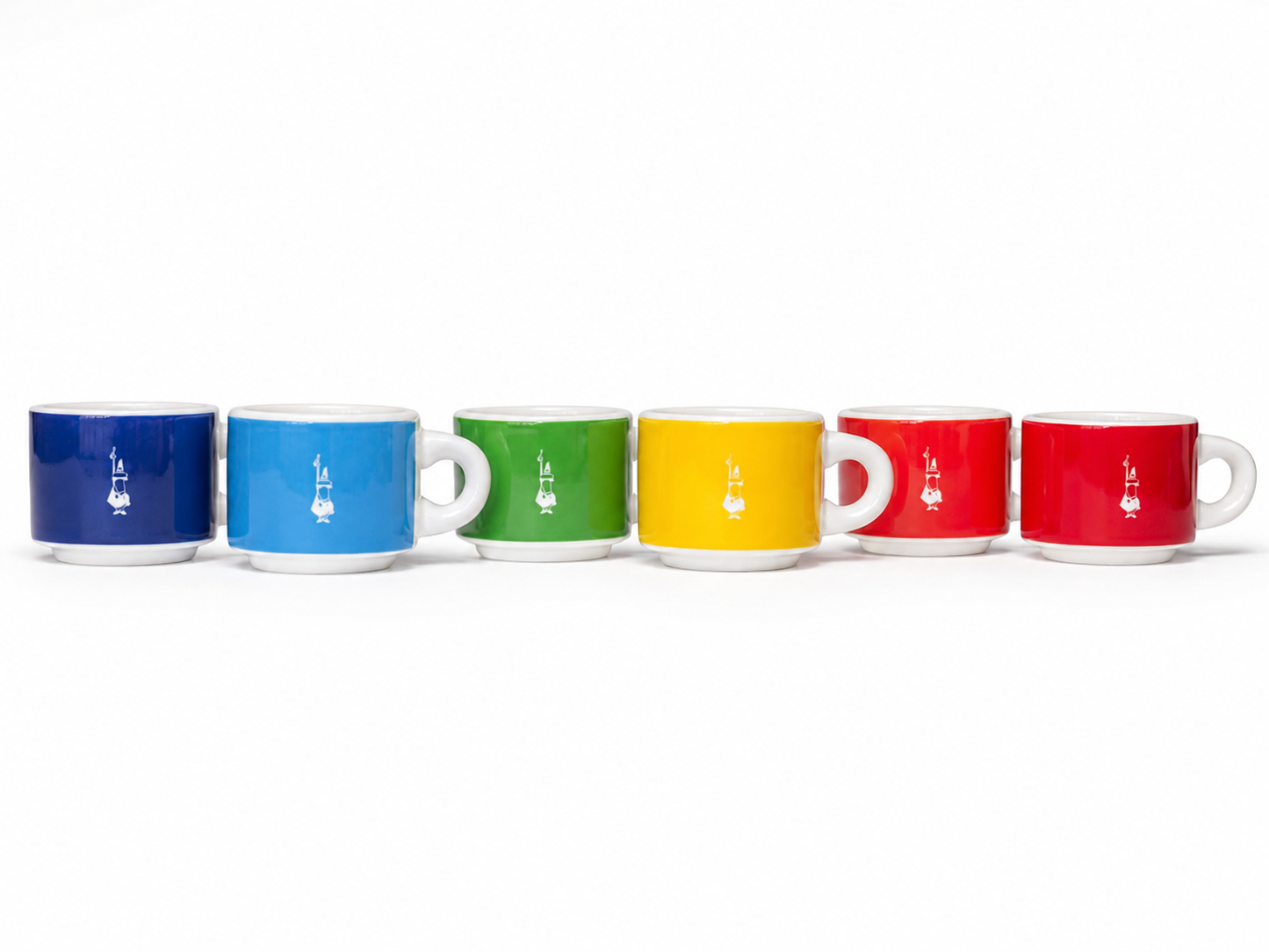 Six ceramic mugs in blue, light blue, green, yellow, red, and dark red, lined up in a row on a white background. Each mug features a small white rabbit silhouette printed on the front.