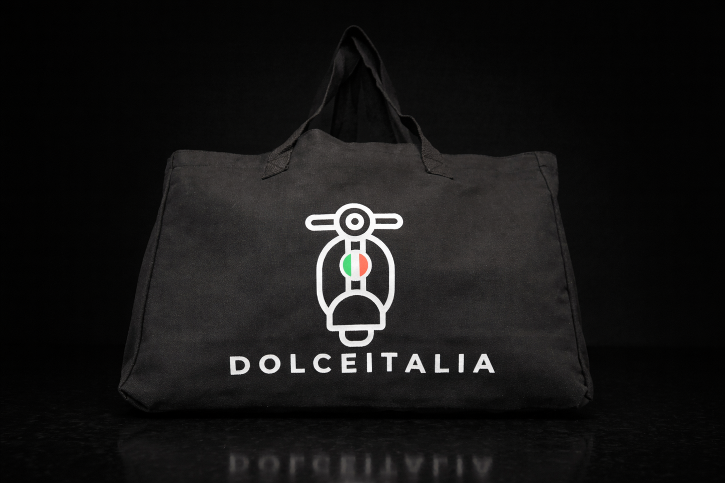 Black tote bag with Dolce Italia logo featuring a scooter on a dark background